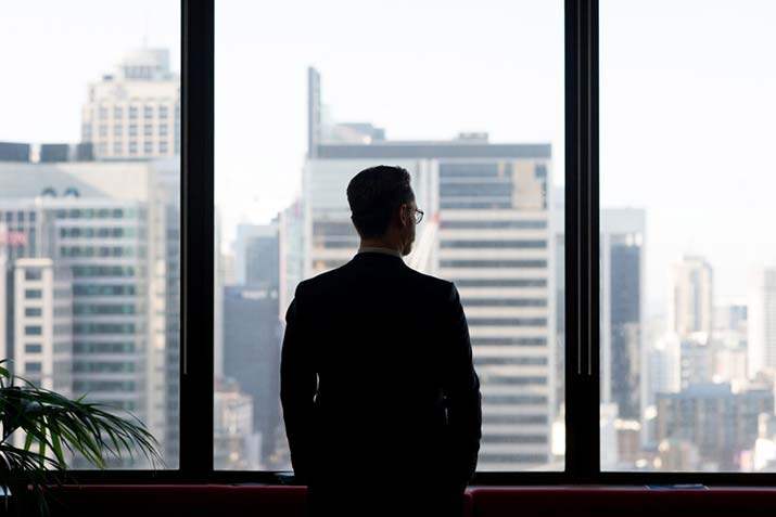 Accounting student Matthew Davis looking out the window